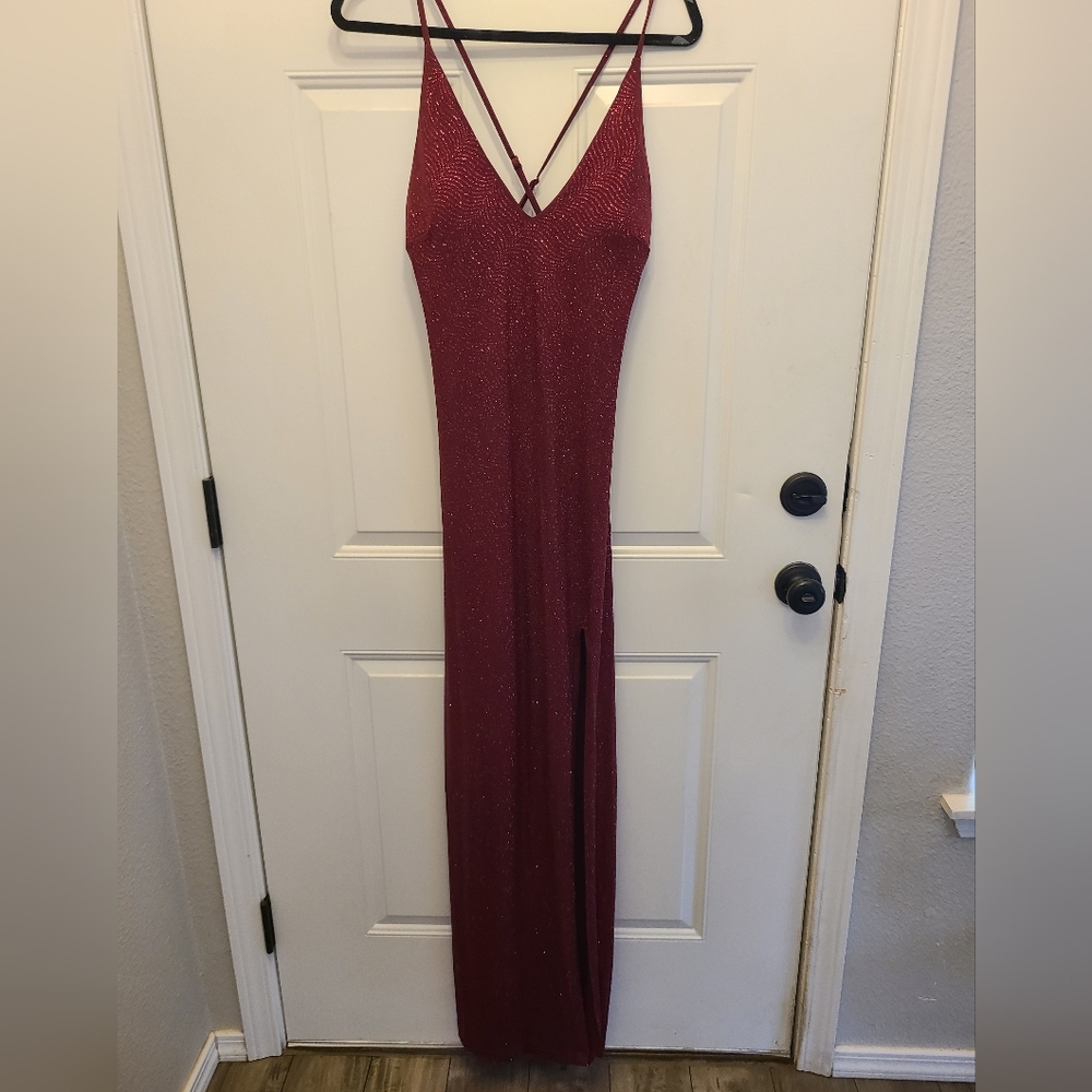 Maroon glitter dress. Built in padding. Adjustable straps. Size 11/12